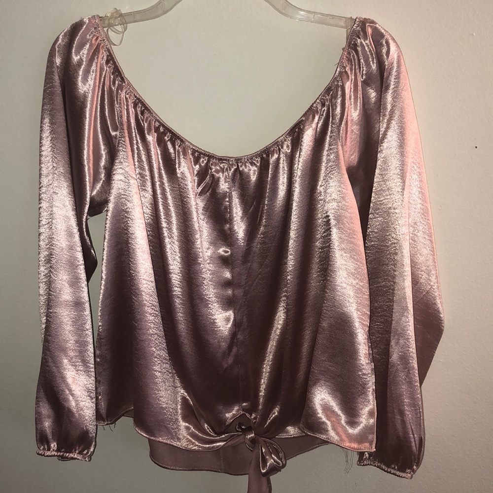 Off the shoulder pink top.